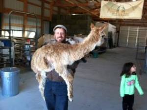 Doug carrying a baby back after dental work.