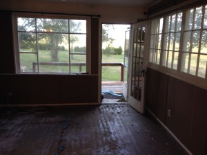 This is the living room looking out the front door.  The houses faces east to embrace the sunrise each morning.