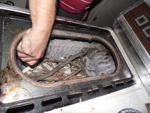 Doug lights the newspaper that is furthest from the pipe as the air will swoosh it from front to back.